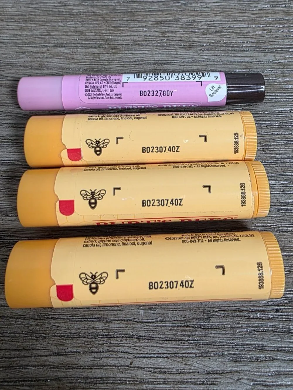 Three (3) Burt's Bees Hot Cocoa Lip Balm and One (1) Lip Shimmer Guava SEALED